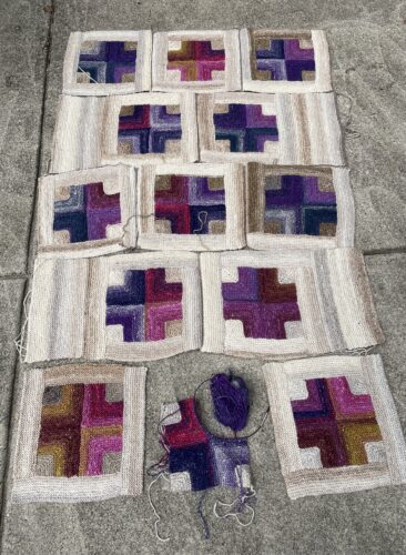 hand knit squares arranged in grid design