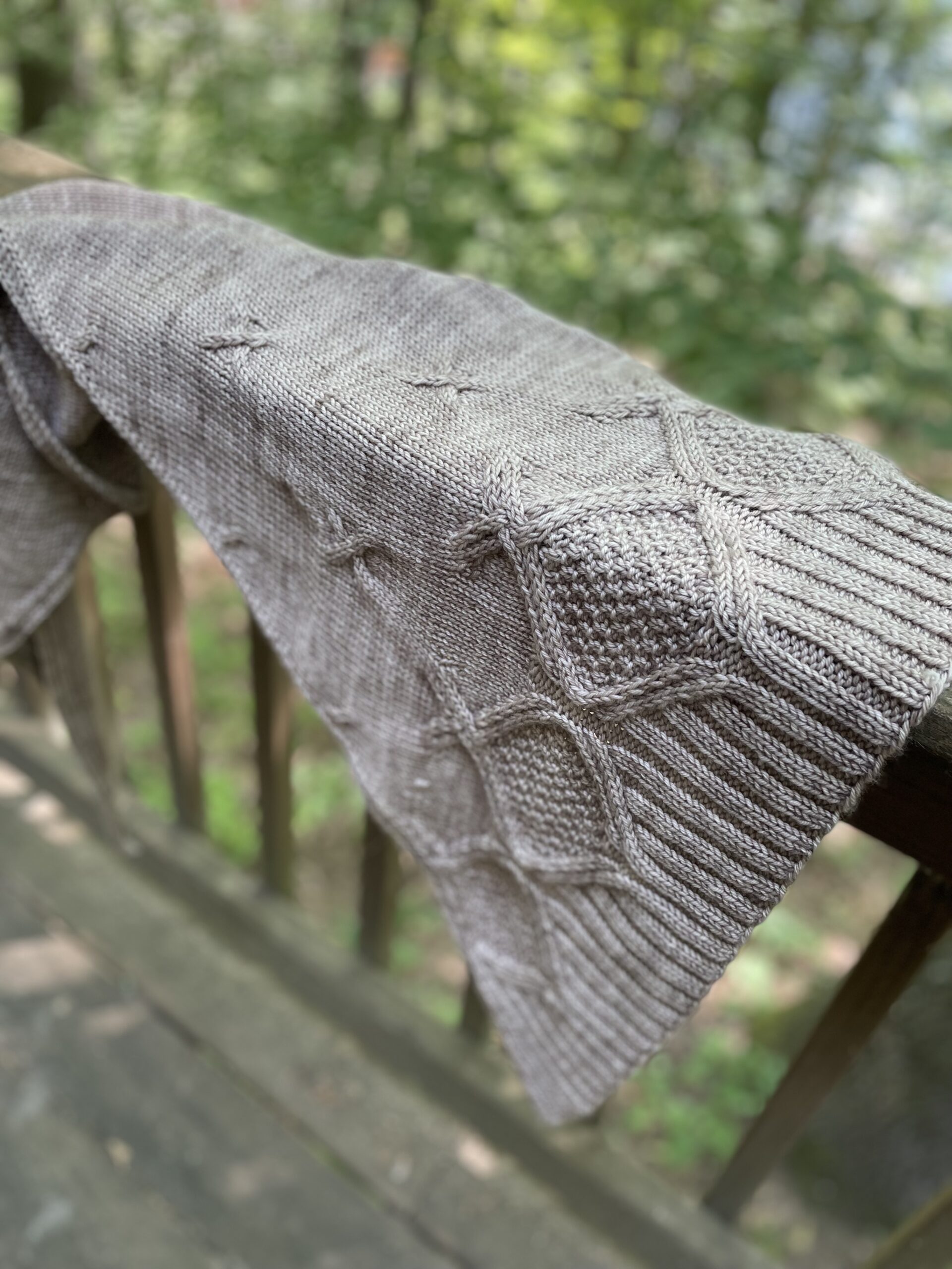 overhead view of cable knit shawl